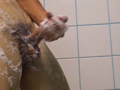 cock massage in the shower after a workout